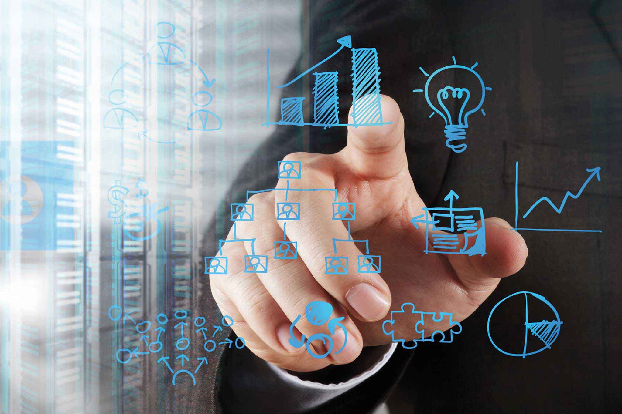 An employee and various graphics are shown in the picture. It is representative of the conceptual services from MAPAL.