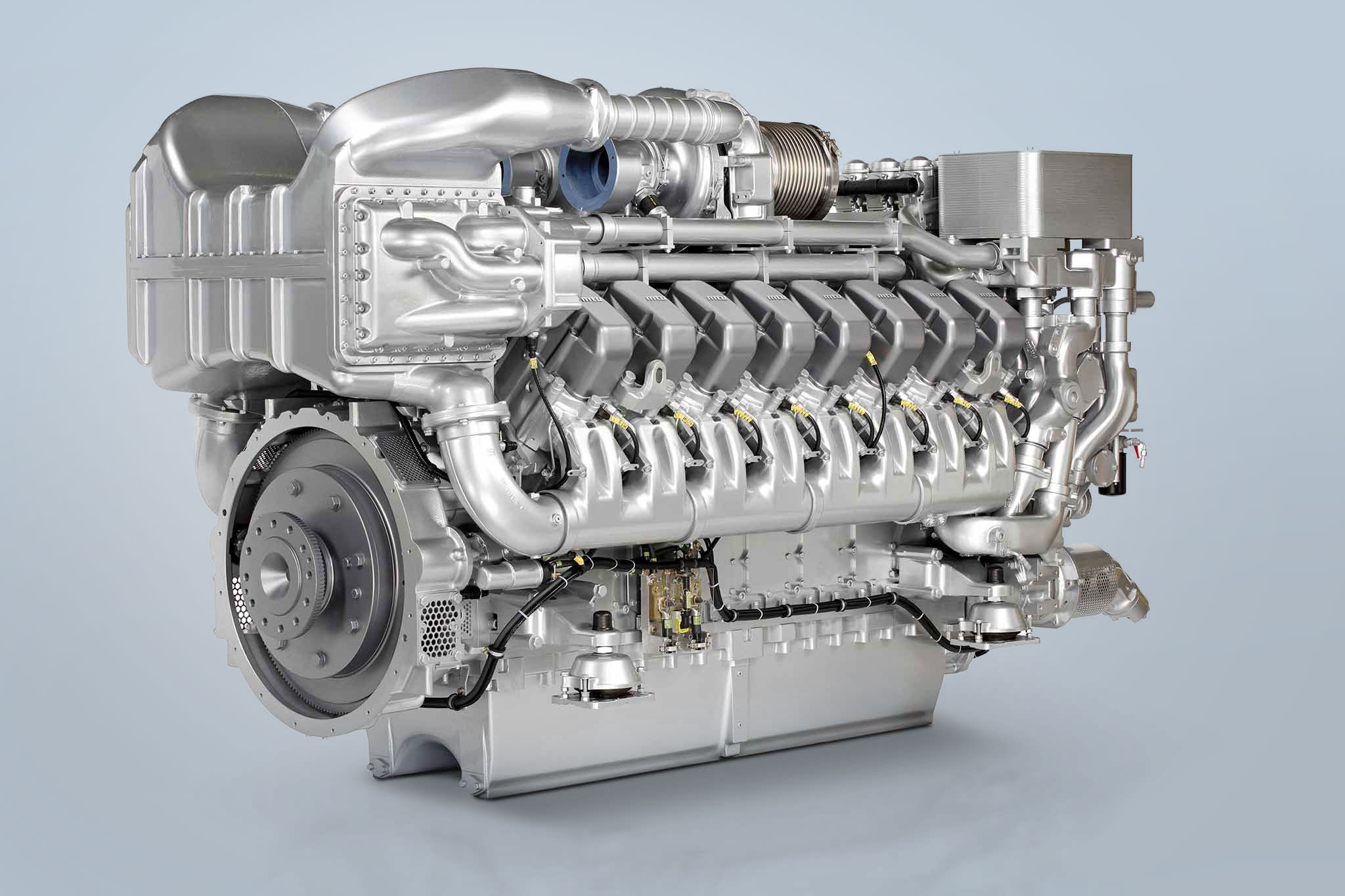 A large engine from MTU is shown against a white background.