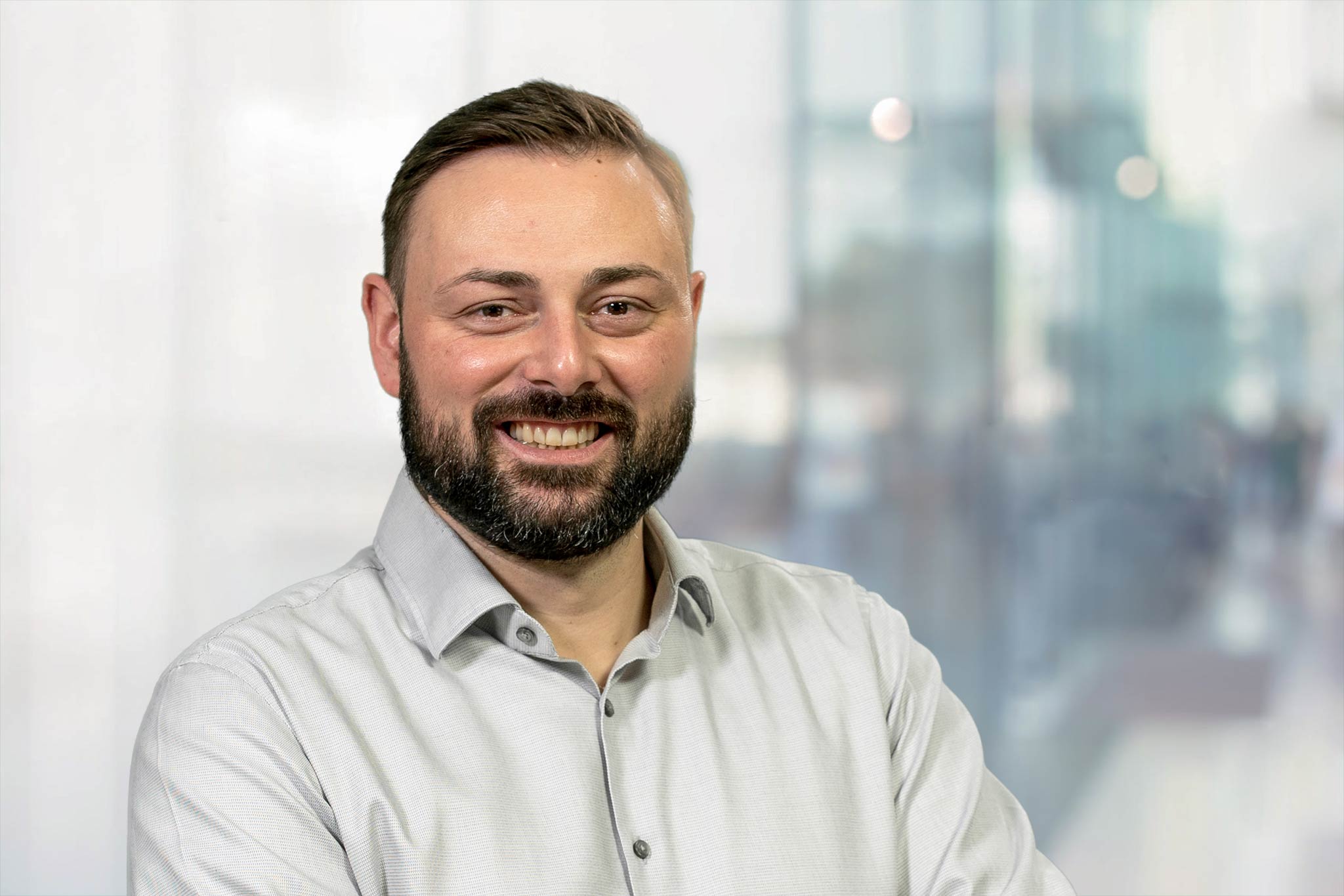 The picture shows Dennis Sandig, Product Owner and Application Manager in the IT department at MAPAL.