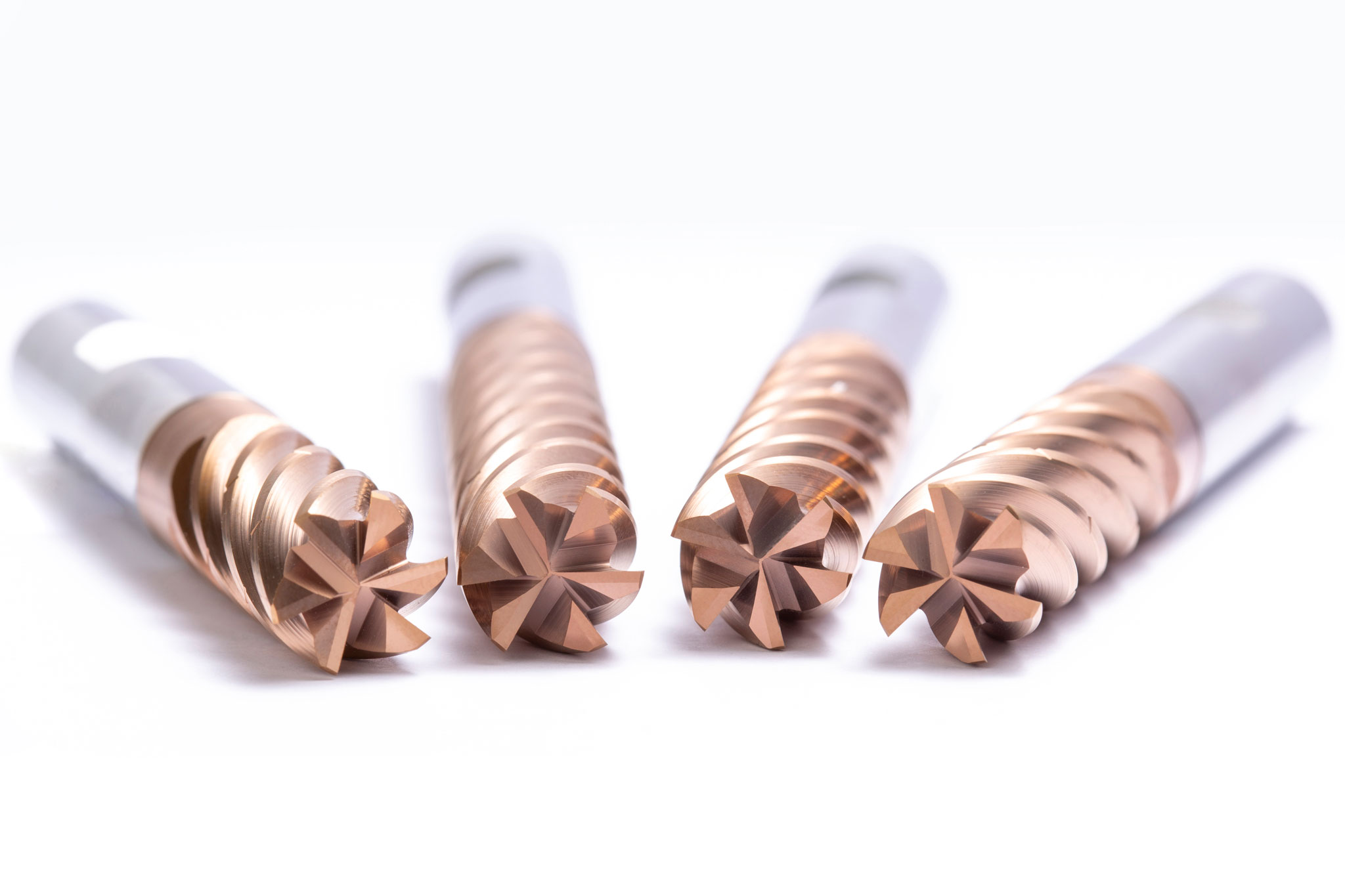A group of four OptiMill-Tro-Inox trochoidal milling cutters arranged side by side.