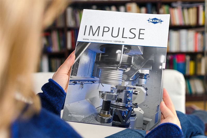 The cover page of the English version of IMPULSE 84 by MAPAL is shown.