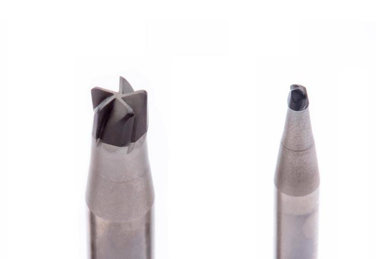 Detailed view of two PCD full-head milling cutters.